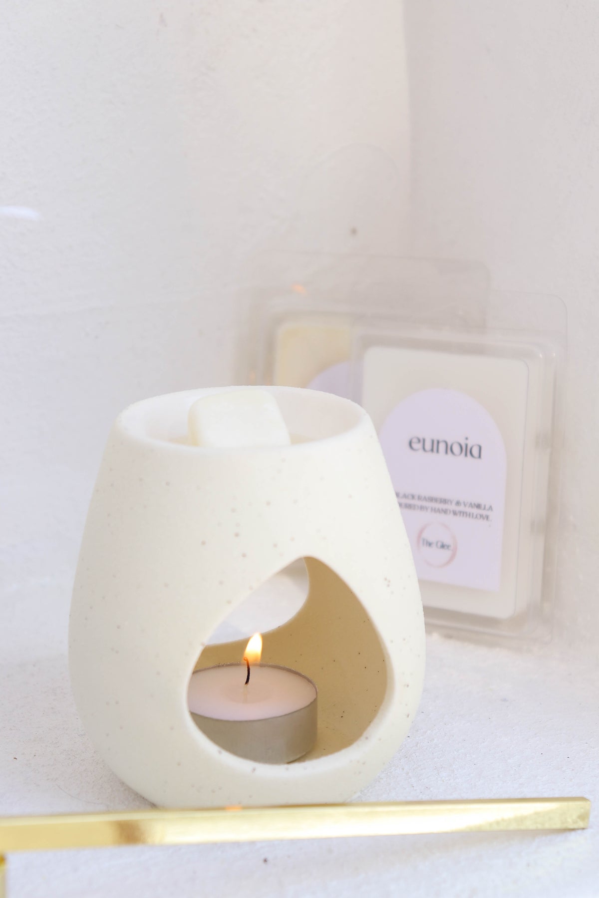 Wax melts and candle tools on a table